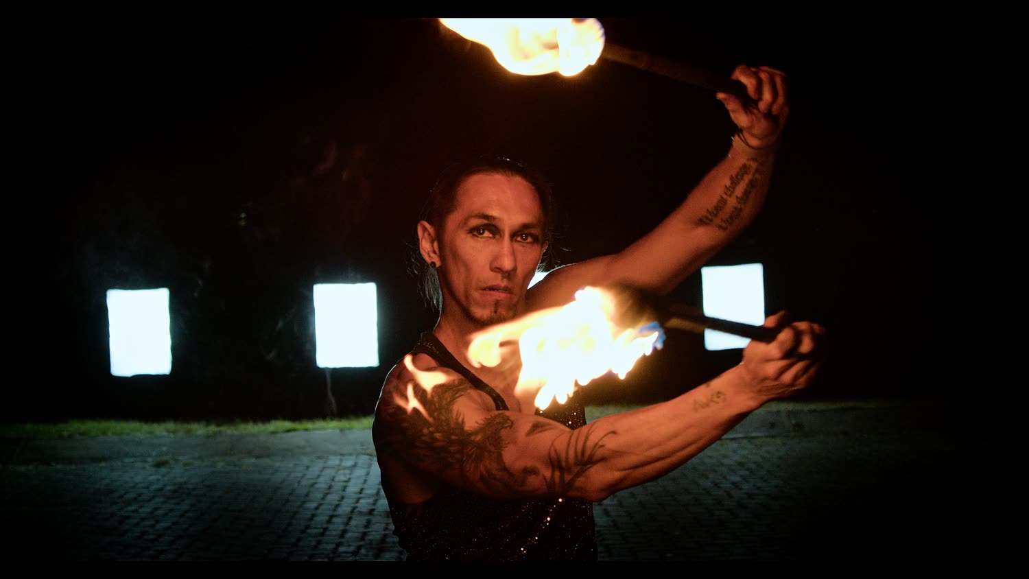 Fire performers lighting up an outdoor event in Johannesburg