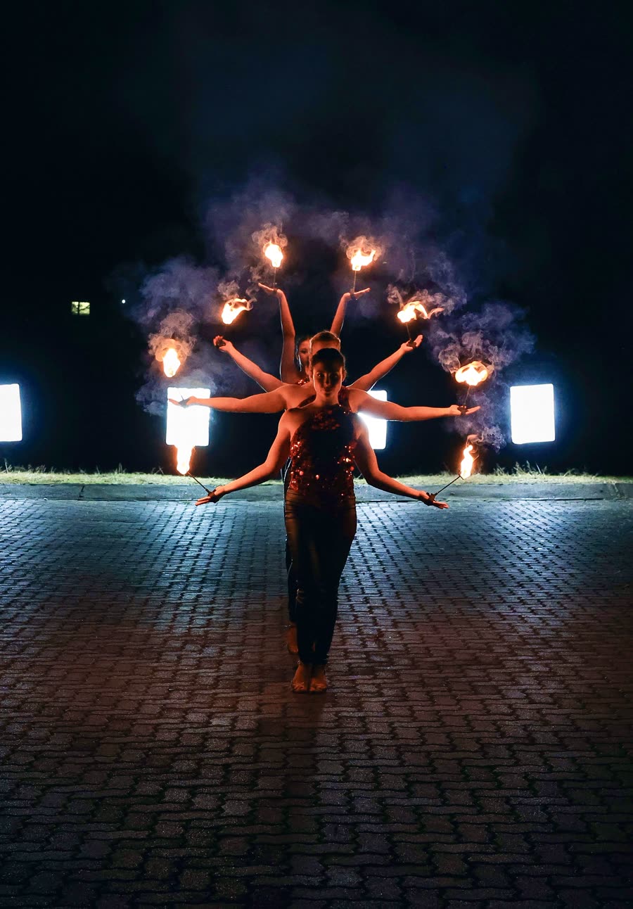 Fire breather performing a flame burst at a Gauteng event